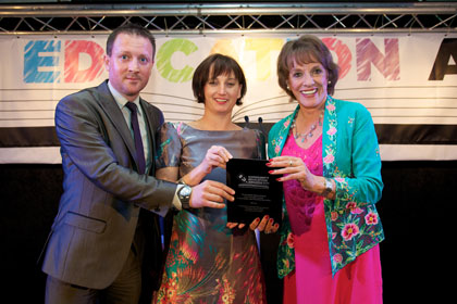 Beth Marley (centre) is presented with The Ecotricity Green Schools Eco-Innovation Award by Rob Davies (Randstad Education) and Esther Rantzen CBE | Community Education Awards with Community Initiative Associates