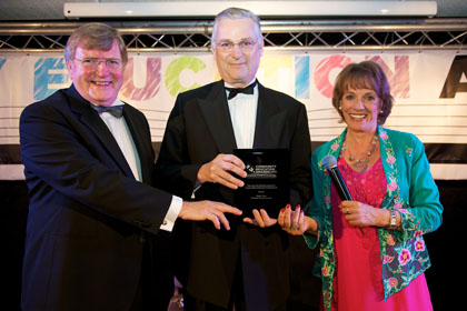 Martin Tuck (centre) receives The Lord John Stevens Award For Outstanding Individual Achievement from Barry Jones MBE and Esther Rantzen CBE | Community Education Awards with Community Initiative Associates