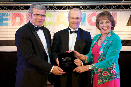 Stuart McLeod (centre) receiving The Community Initiatives Associates Money Management Award from Steve Jackson (Head of Customer Relations, Community Initiatives Associates) and Esther Rantzen CBE | Community Education Awards with Community Initiative Associates