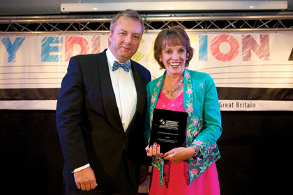 Esther Rantzen CBE accepts the SCC Internet Safety Project Award on behalf of Burgate School and Sixth Form Centre from SCC representative, Stephen McCafferty | Community Education Awards with Community Initiative Associates