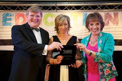 Jeanette Robinson (centre) receives The Barry Jones MBE Award for Outstanding Pupil Referral Unit (PRU) Mentor from Barry Jones MBE and Esther Rantzen CBE | Community Education Awards with Community Initiative Associates